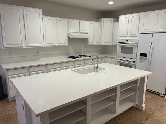 Building Photo - THIS 2 STORY HOME IN A GATED COMMUNITY HAS...