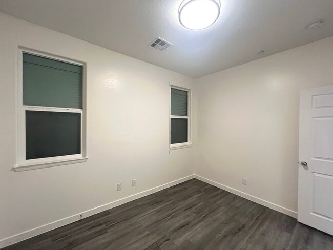 Building Photo - Single-story 1326 sq ft, townhome built in 2019 w/3 bed, 2 bath & spacious attached 2-car garage ...