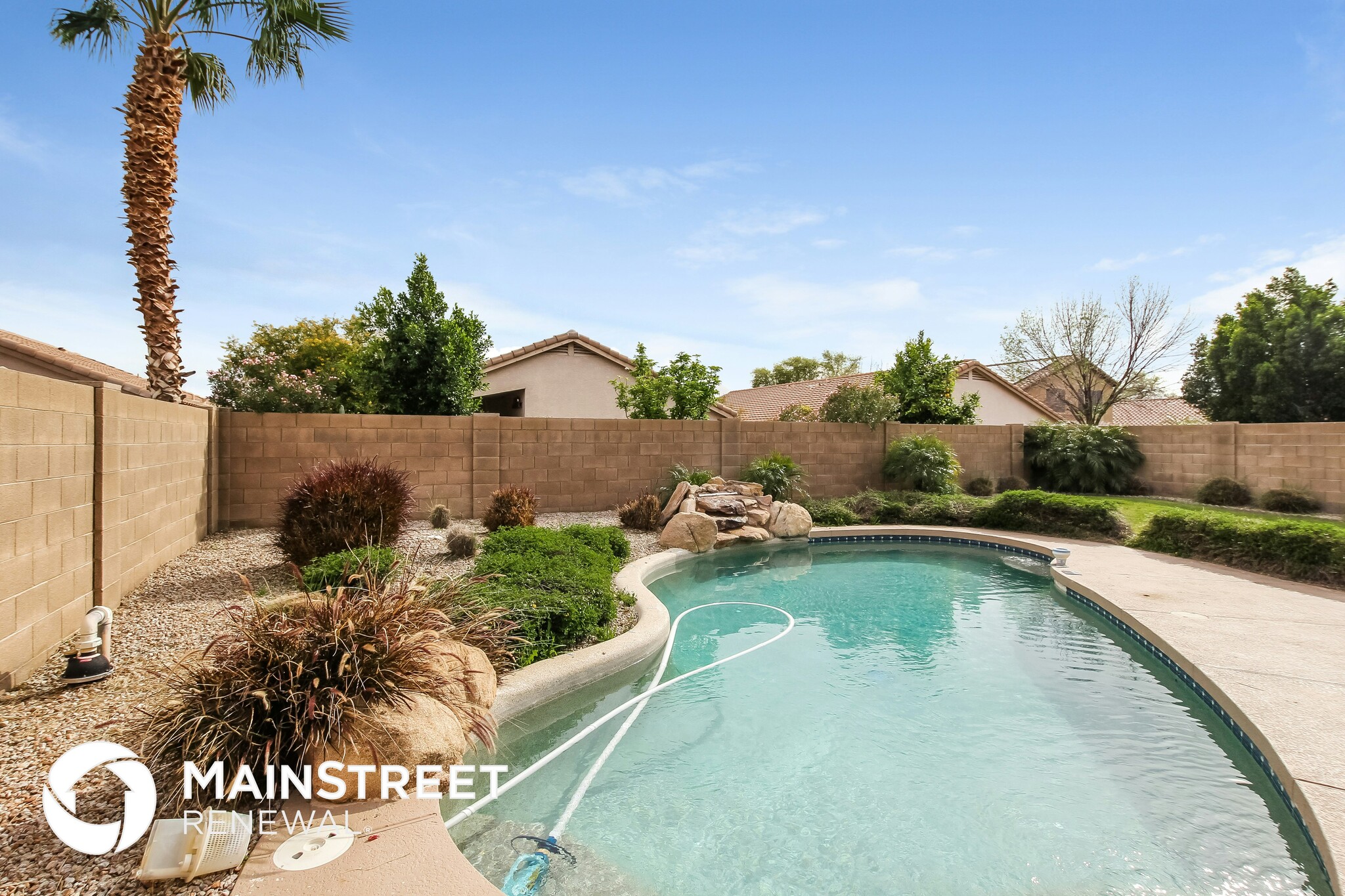 Building Photo - 7013 W Aire Libre Ave