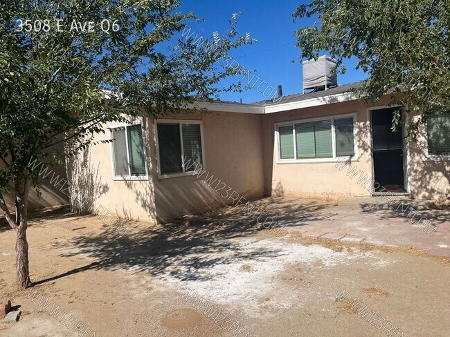 Building Photo - 3508 E Ave Q6