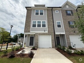 Building Photo - Stunning End Unit New Construction 3BD, 3....