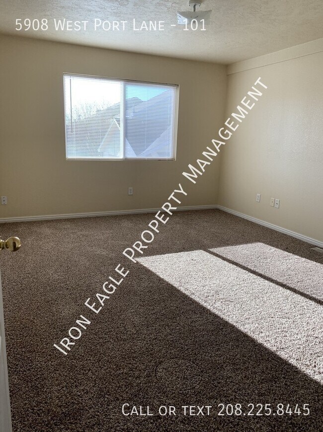 Building Photo - 5908 West Port Lane - 101-