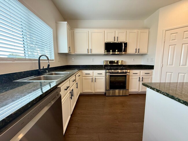 Building Photo - COMING SOON 5/BD 3/BA Home W/ Expansive Yard, Solar Panels, and No Rear Neighbors!