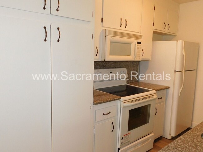 Building Photo - Affordable 2bd/1ba Fourplex with Garage ne...
