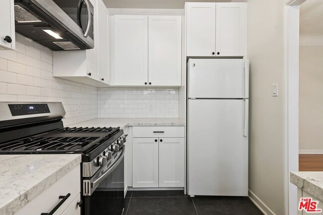 Building Photo - 1142 S Clark Dr