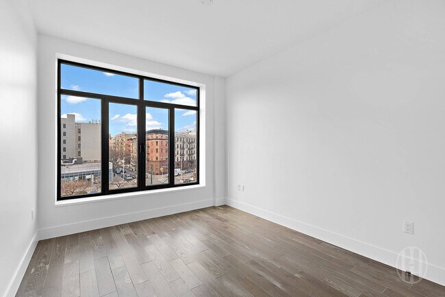 Building Photo - 10 Malcolm X Blvd