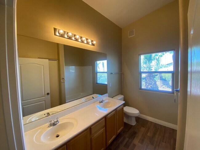 Building Photo - All NEW flooring in this spacious 3-bedroo...