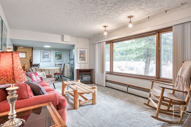 Building Photo - On the Blue River!  HUGE 4 Bedroom home, Furnished Updates throughout!  Bus route!  Spacious parking