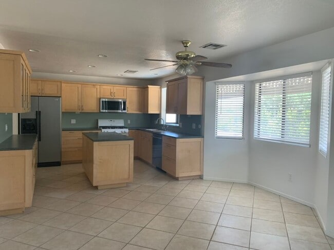 Building Photo - Four Bedroom Home with Utilities included!