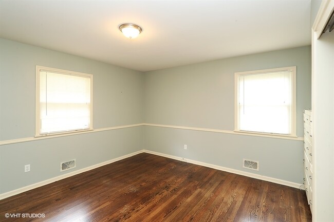 One of three bedrooms upstairs - 11009 Elmwood Ave