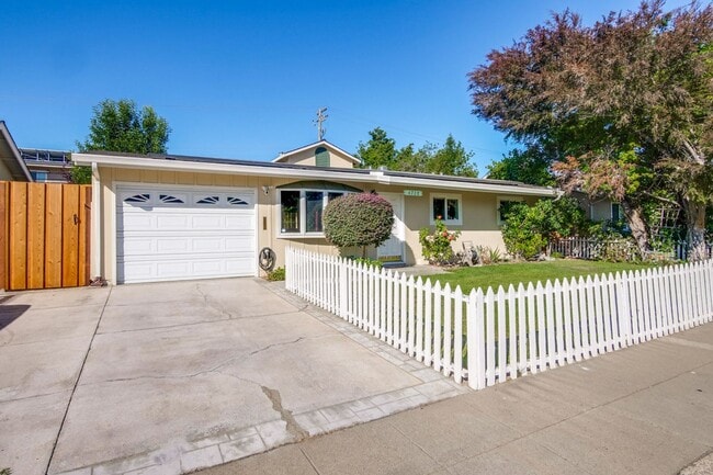 Building Photo - Turnkey Home with Natural Light & Upgrades...