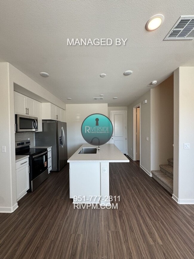 Building Photo - New Build Gem! Modern Three-Bedroom Condo with Bright Open Layout & Patio – Available Now!