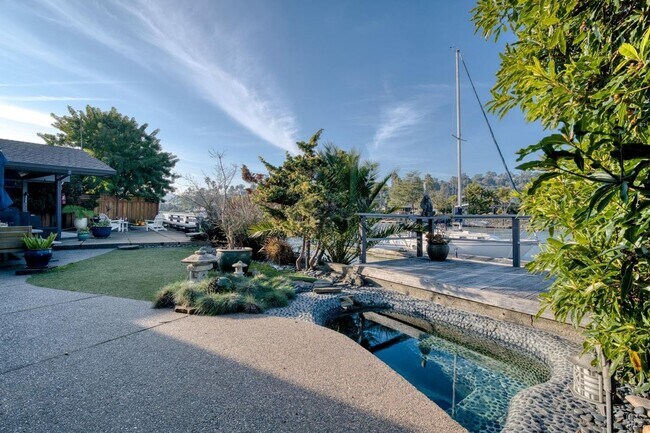 Building Photo - Luxury Waterfront Home with Private Deepwater Dock and Hot Tub- FOUNDATION