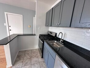 Building Photo - 5668 N Ridge Ave