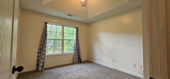 Building Photo - Commanding Curb Appeal, Conveniently Place
