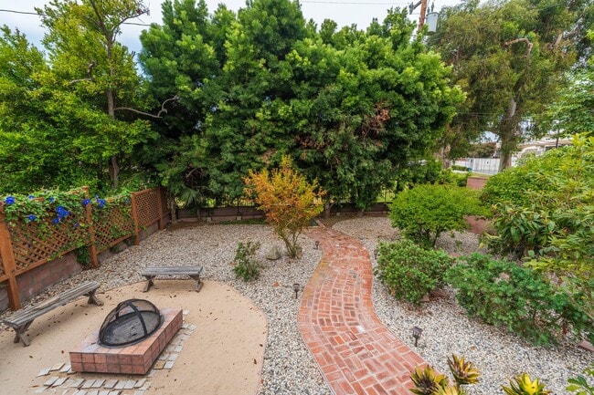 Building Photo - One-of-a-Kind Riviera Home Backing to El R...