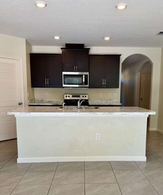 Building Photo - Palm Bay Pool Home Stunner!