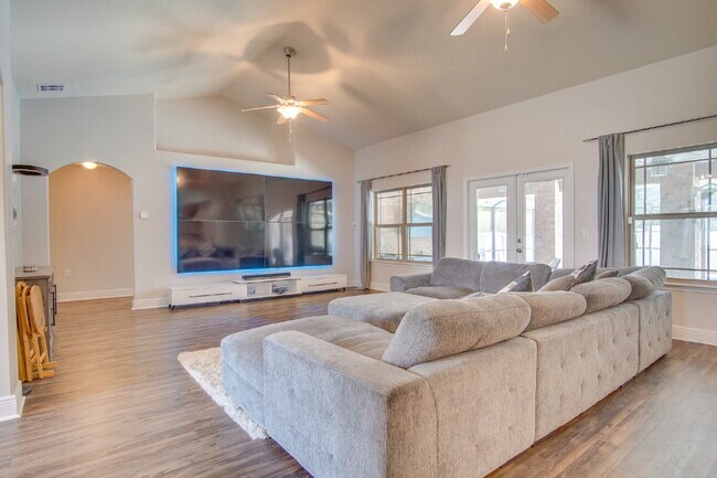 Building Photo - Milton 4BR Pool Home with Office, Vaulted Ceilings, Screened Saltwater Pool & 2-Car Garage