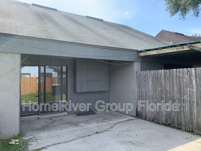 Building Photo - 8745 Whispering Pines Dr