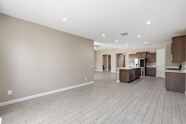 Building Photo - Spacious 5-Bedroom Home with Open Floor Plan & Private Backyard