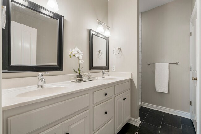 Primary bath with new tile throughout - 1117 E 7th St
