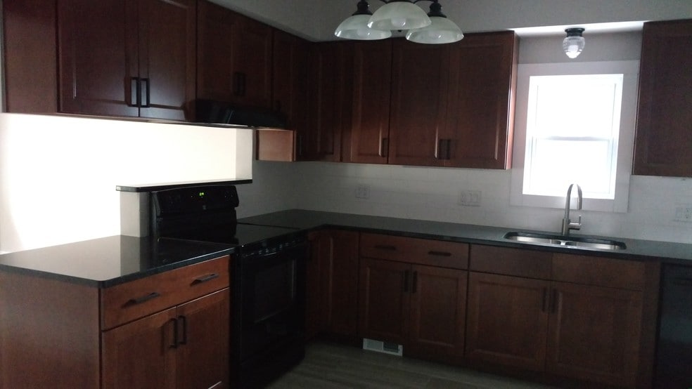 KITCHEN WITH CHANDELIER - 40 Chestnut Ave