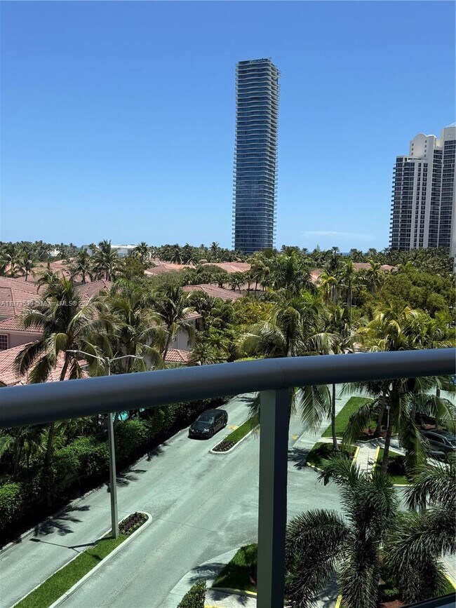 Building Photo - 19380 Collins Ave