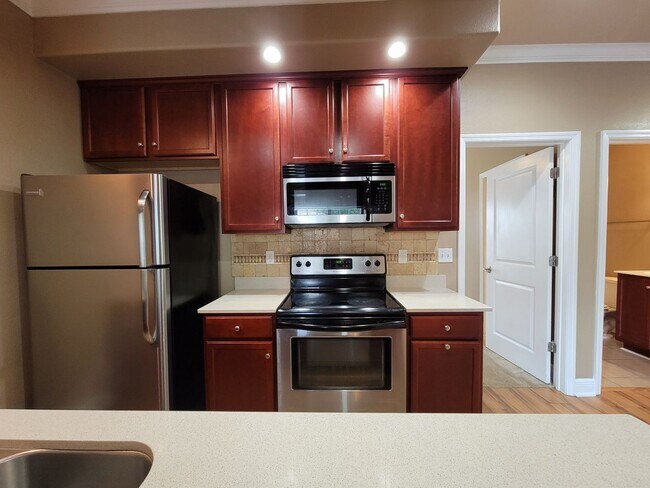 Building Photo - 3 Bedroom town home for rent August 6, 2026 in gated community with pool, renting for $1550 per m...