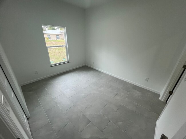 Building Photo - ONE OF A KIND! BRAND NEW 1 Bedroom-1 Bath- 1 Car Garage in Desirable Lehigh Acres!