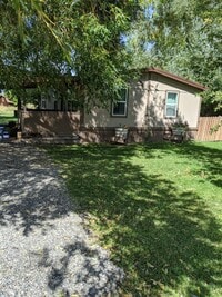 Building Photo - Cozy pet friendly location on a large lot