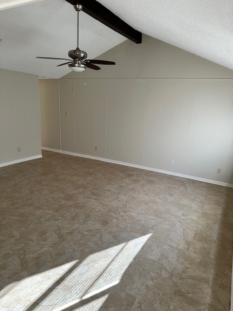 Living area with beautifully updated tile flooring - 128 Dallas St