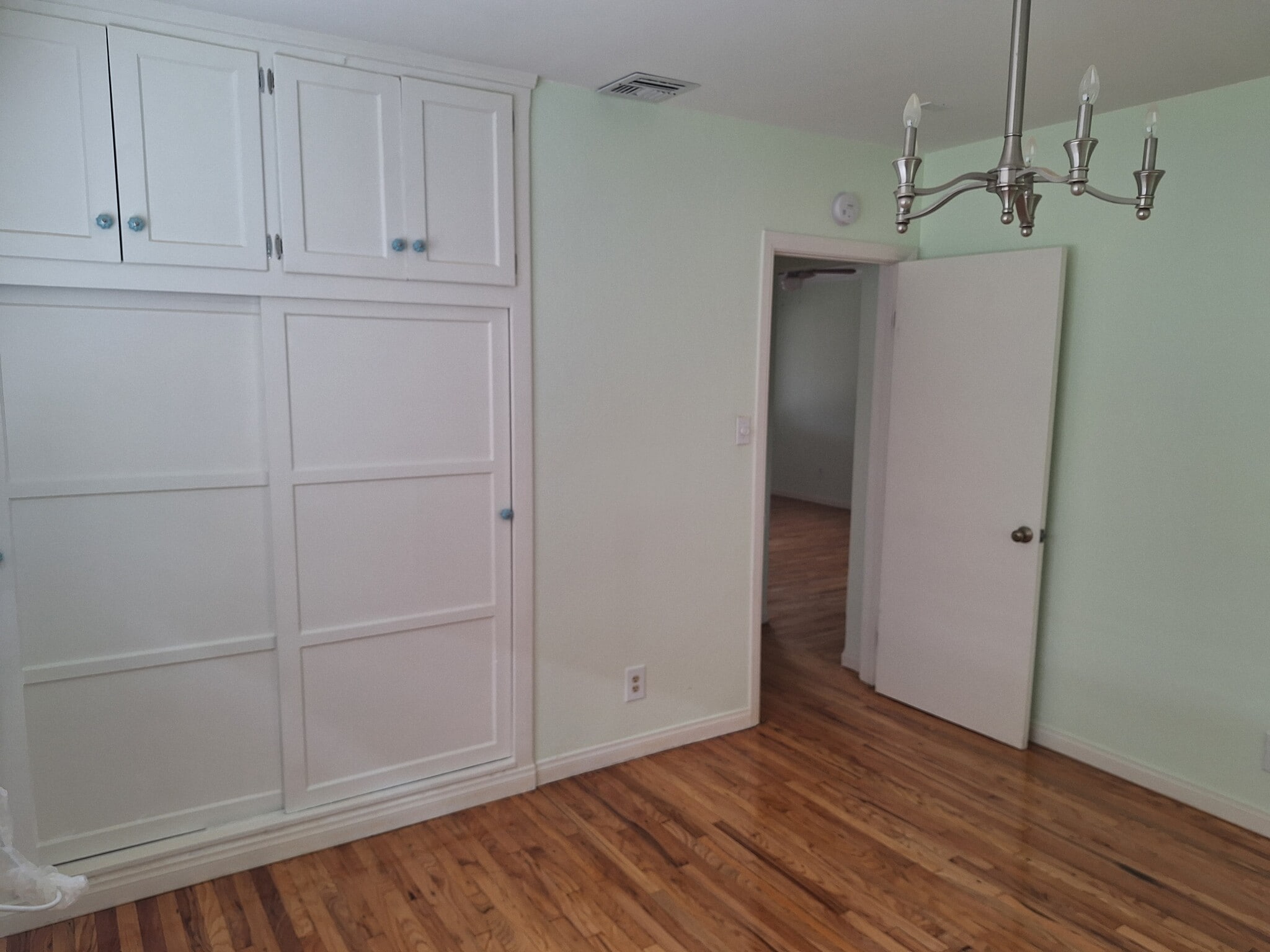 View from bedroom to hallway to livingroom - 16663 Victory Blvd