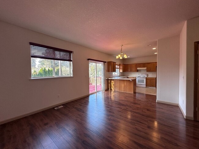 Building Photo - Welcome to this spacious and inviting single-family home w/fully fenced backyard! New Carpet Inst...