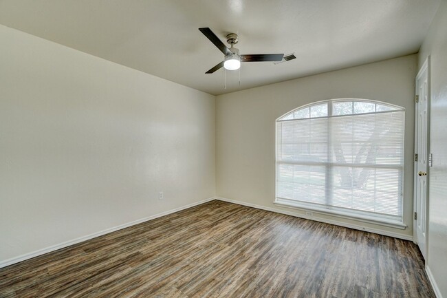 Building Photo - Spacious 4-Bedroom Home with Corner Firepl...