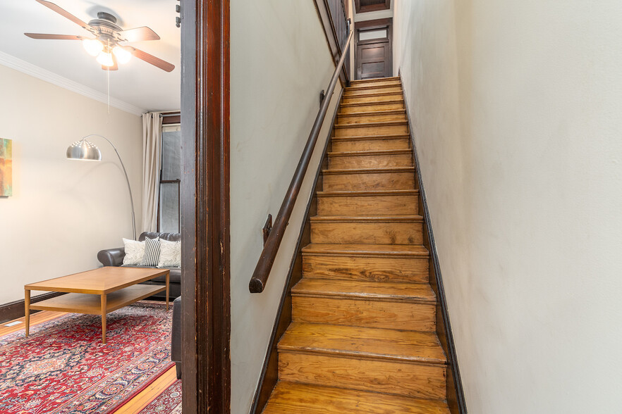 first floor staircase - 724 13th St SE