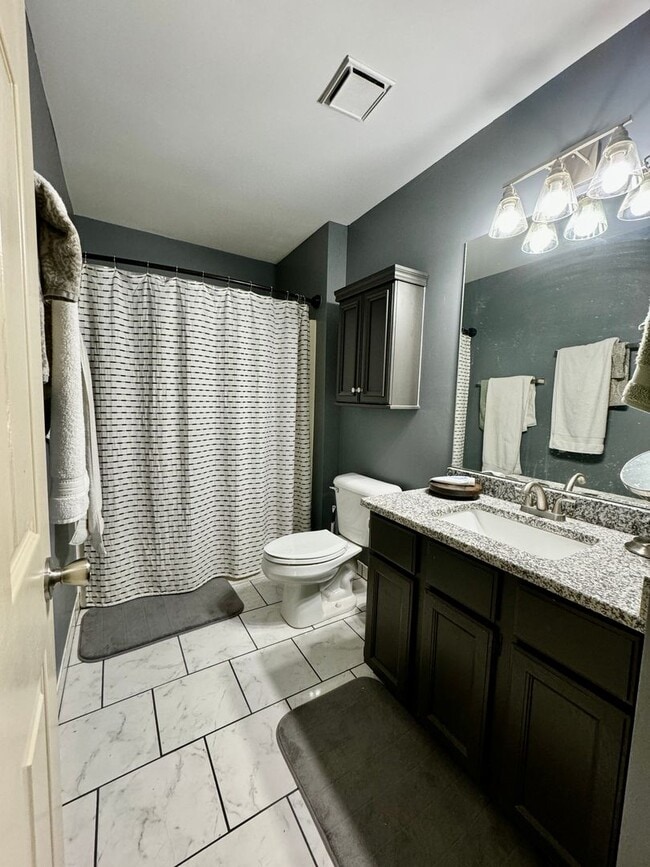 Building Photo - 4 Bedrooms with Finished Basement and Bonus Room!