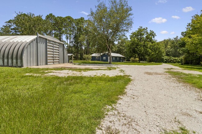 Building Photo - Cottage on 3 Acres with Massive Workshop & Storage