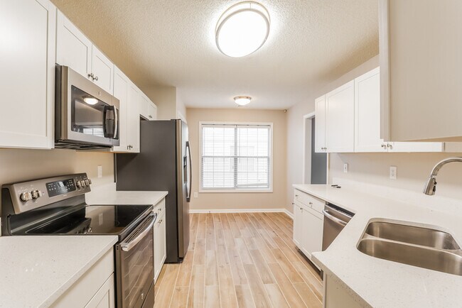 Building Photo - Spacious 4-Bedroom on a Corner Lot