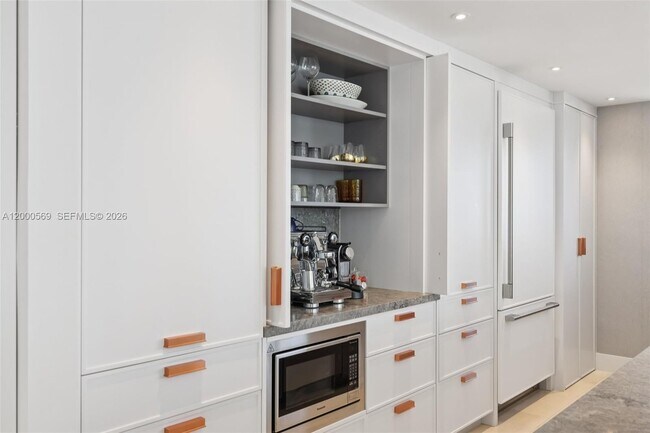 Building Photo - 10275 Collins Ave