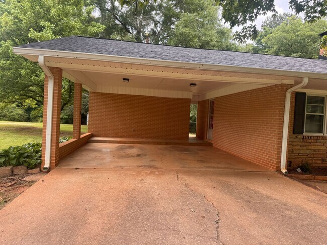 Building Photo - Spacious Brick Ranch on 3 Private Acres in Commerce