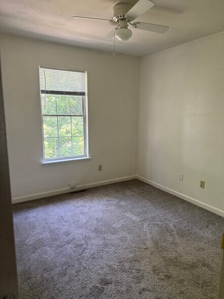 One of 4 bedrooms (with ceiling fan) - 834 Patrick Henry Dr