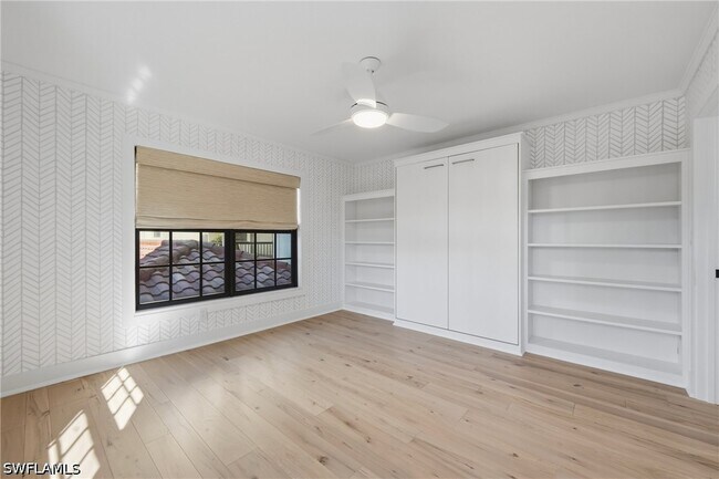 Building Photo - 6080 Pelican Bay Blvd