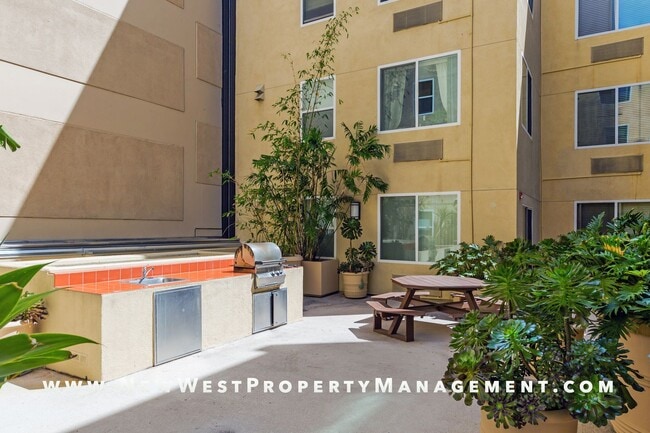 Building Photo - Charming Little Italy 1-Bedroom at Portico! Small Pet OK! Available Now!