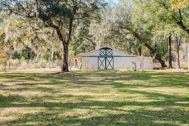 Building Photo - Secluded Four Bedroom Home on Seven Acres in Midway Farms!