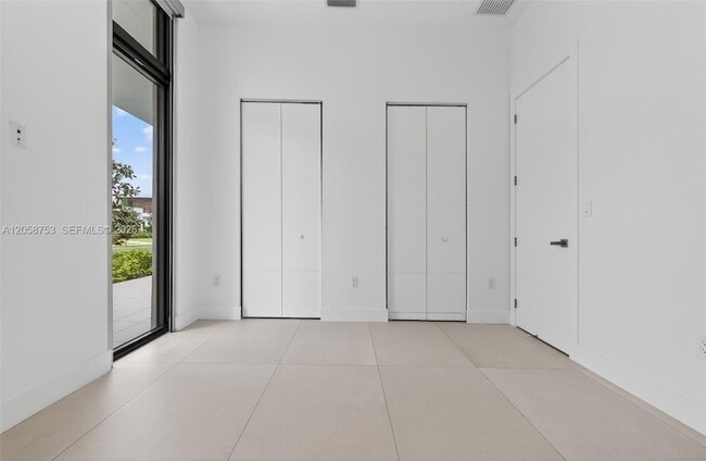 Building Photo - 16709 Botaniko Dr N