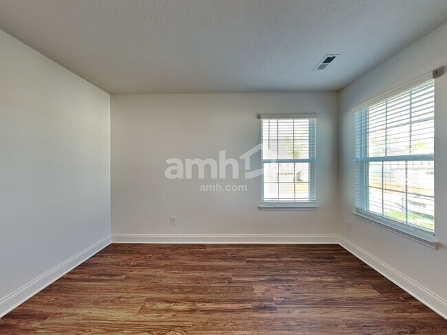 Building Photo - 8331 Merlin Dr