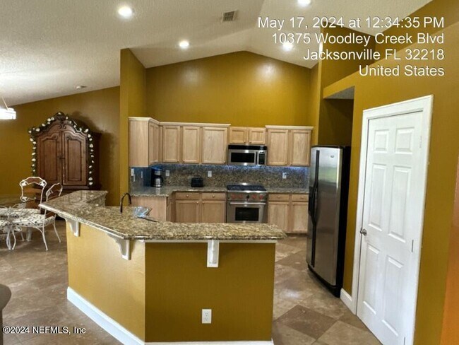 Building Photo - 10375 Woodley Creek Blvd