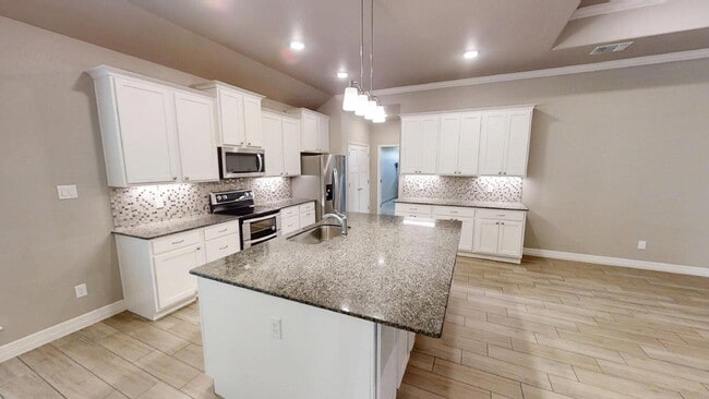 Building Photo - "Charming 4-Bedroom Retreat with Granite E...