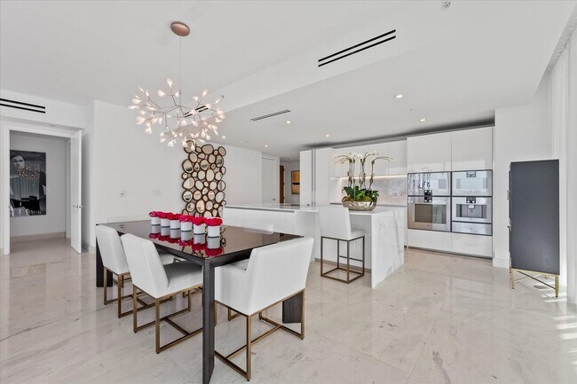 Building Photo - 10201 Collins Ave