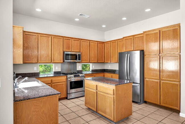 Building Photo - Move-In Ready 4-Bed, 3-Bath Gem in a Covet...